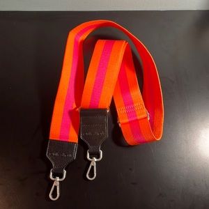 orange and pink crossbody strap in like-new condition